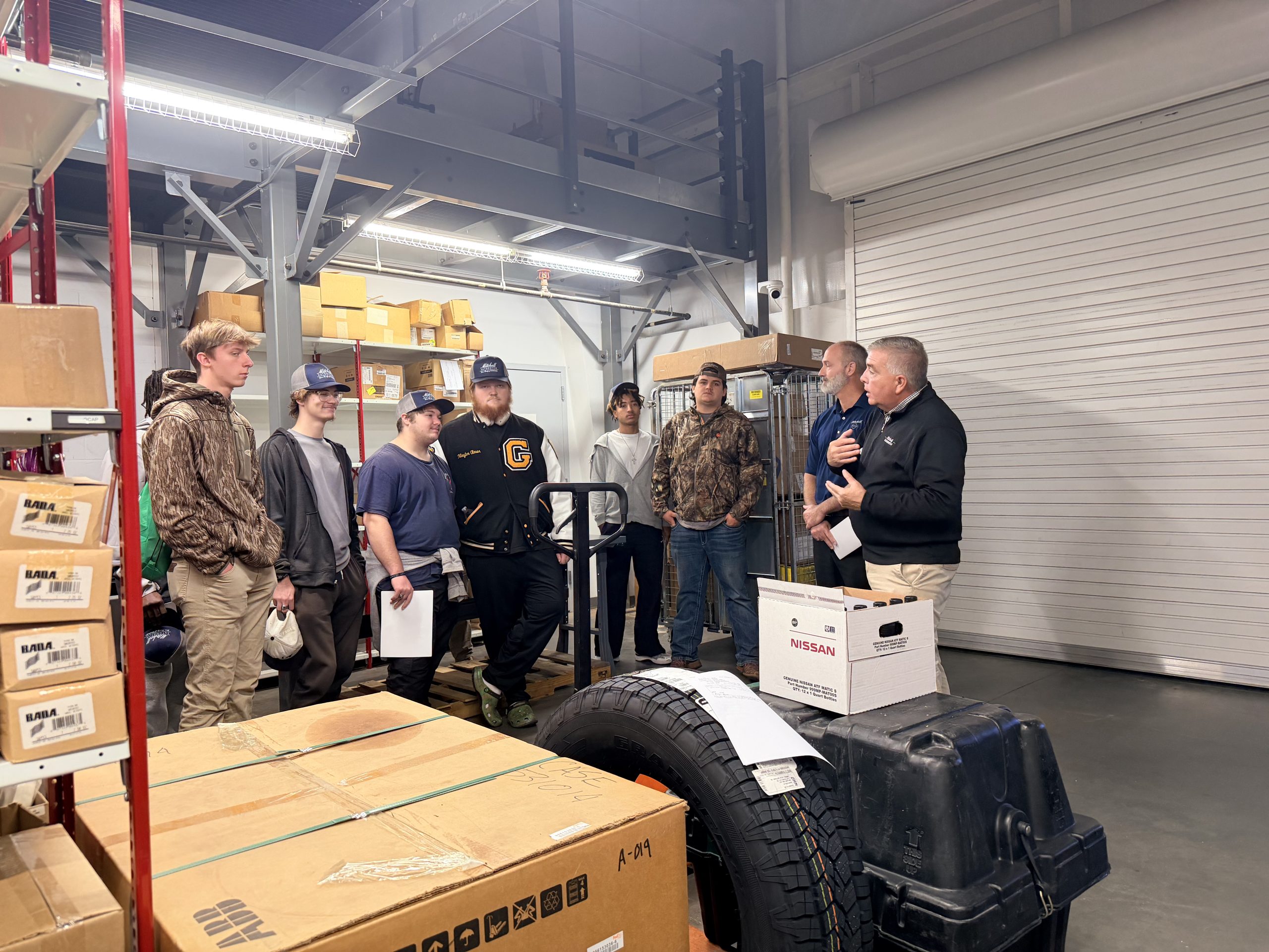 Automotive Career Tech students learning about dealership parts operations